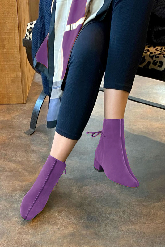 Amethyst purple women's ankle boots with laces at the back. Round toe. Low block heels. Worn view - Florence KOOIJMAN